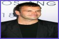 Jonny Lee Miller flashes ink for Ellen charity